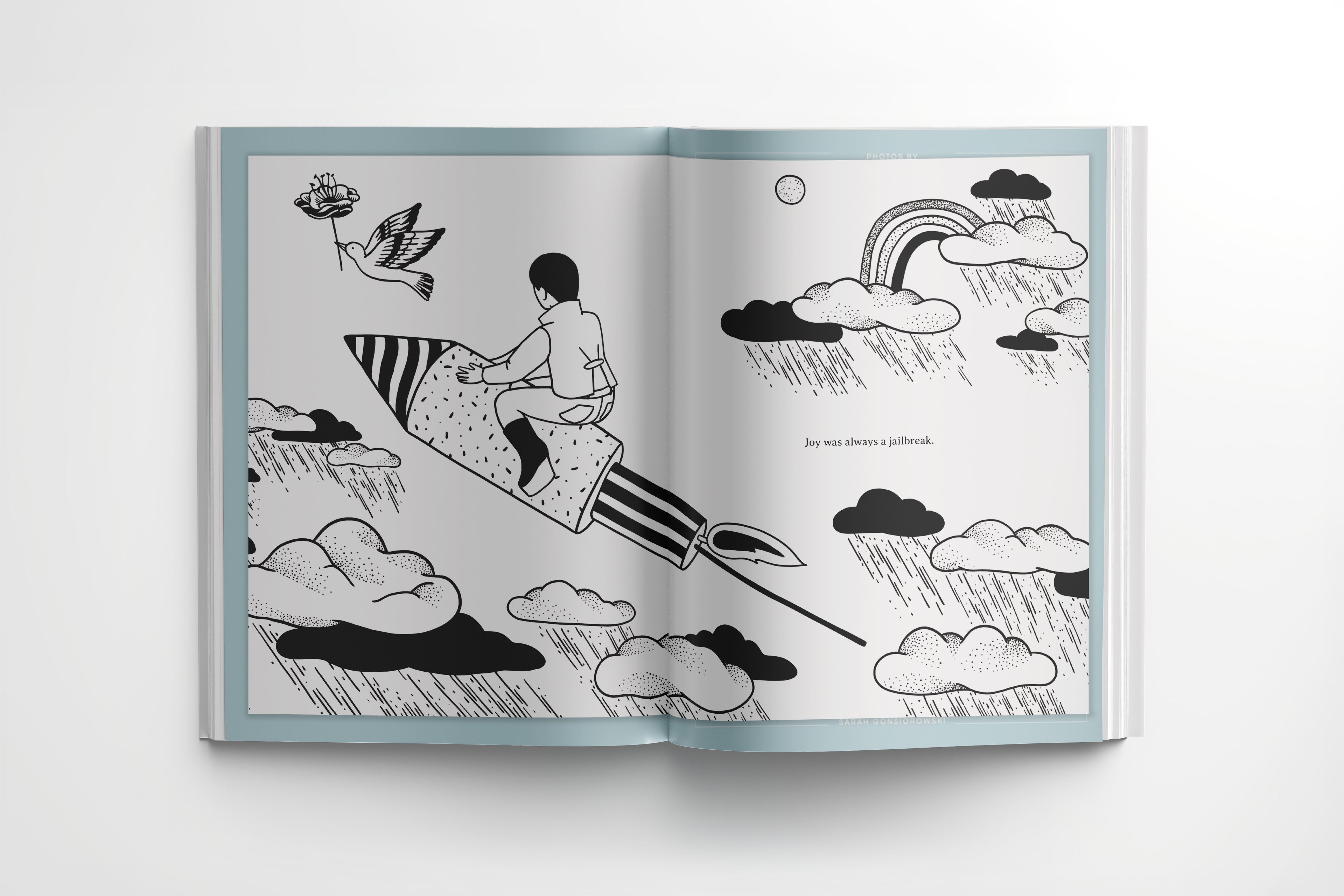 Different Leaf Season One spread with black and white illustration of person riding rocket through clouds and rain